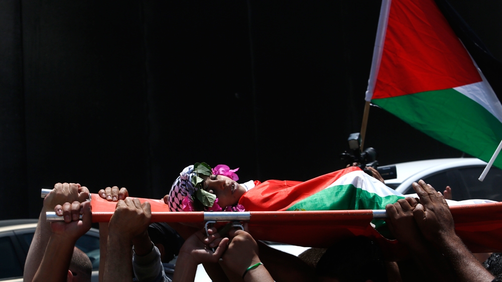 File: body of Muhey al-Tabakhi, 12, who was killed after clashes erupted between Israeli forces and protesters in the West Bank