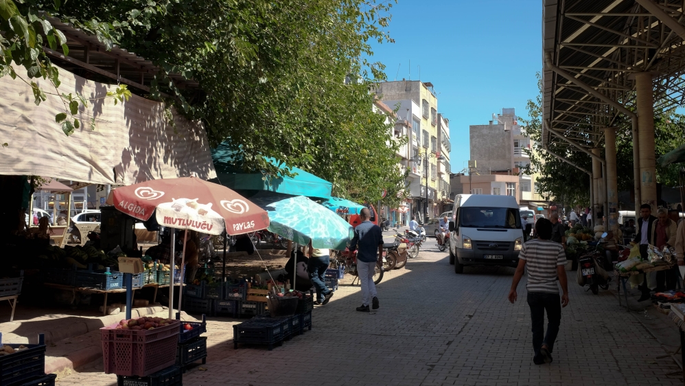 One of the rockets fired on Thursday landed around the corner from this market [Megan O'Toole/Al Jazeera]