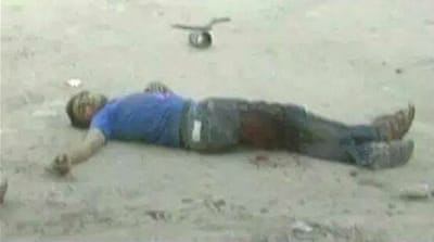 Hamed al-Shobaky shortly after he was hit trying to transfer bodies into ambulances in the 2014 Israeli war on Gaza [Courtesy of Hamed al-Shobaky]