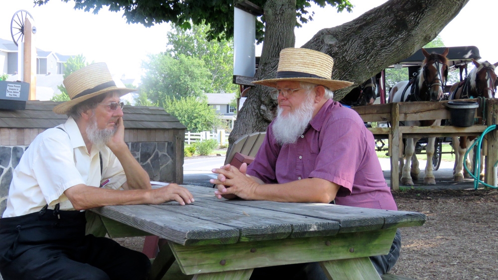 
Melvin 77, left, and Aaron, 70 discuss the elections. Aaron said he does not approve   of Trump being a casino owner  . 'We're not like the Baptists or the Lutheran folks. They might tell him what to do … we are not going to tell you what to do' [Jessica Sarhan/Al Jazeera]
