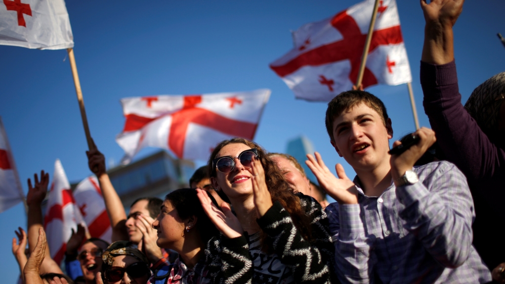 Supporters attend a pre-election rally of the largest opposition party United National Movement in Tbilisi, Georgia [REUTERS]