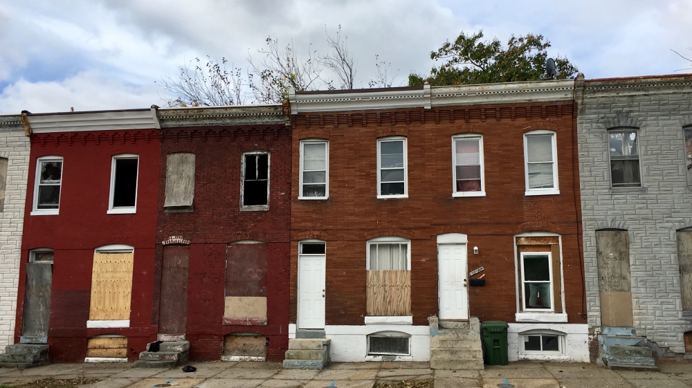 Cheatham want this row of houses, part of the neighbourhood's 'worst drug area', demolished [Cajsa Wikstrom/Al Jazeera]