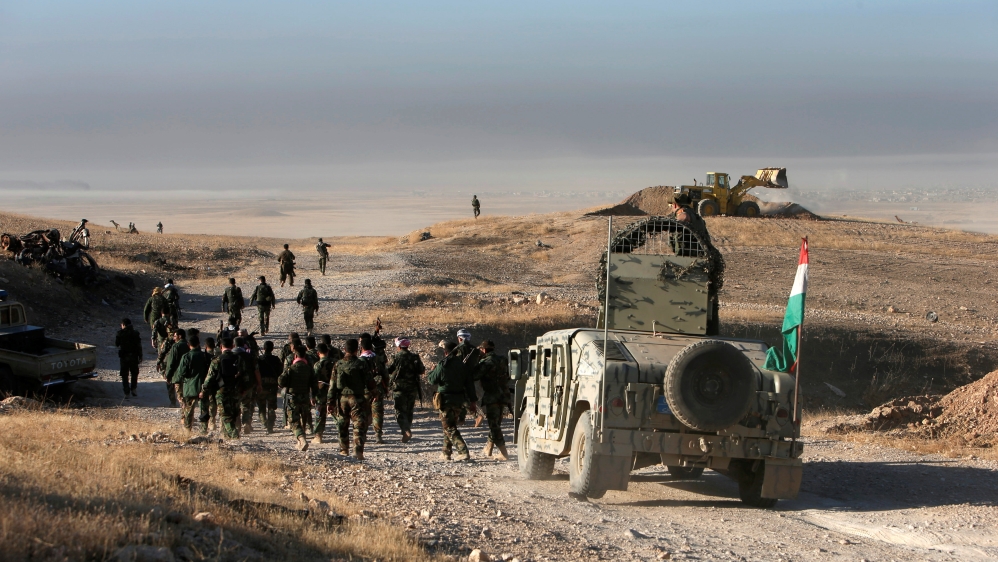 Peshmerga forces advance in the east of Mosul to attack ISIL fighters in Mosul, Iraq [REUTERS]
