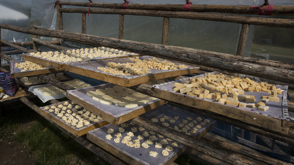 Dairy products dry before being sold in Ikh Tamir [Taylor Weidman/Al Jazeera]