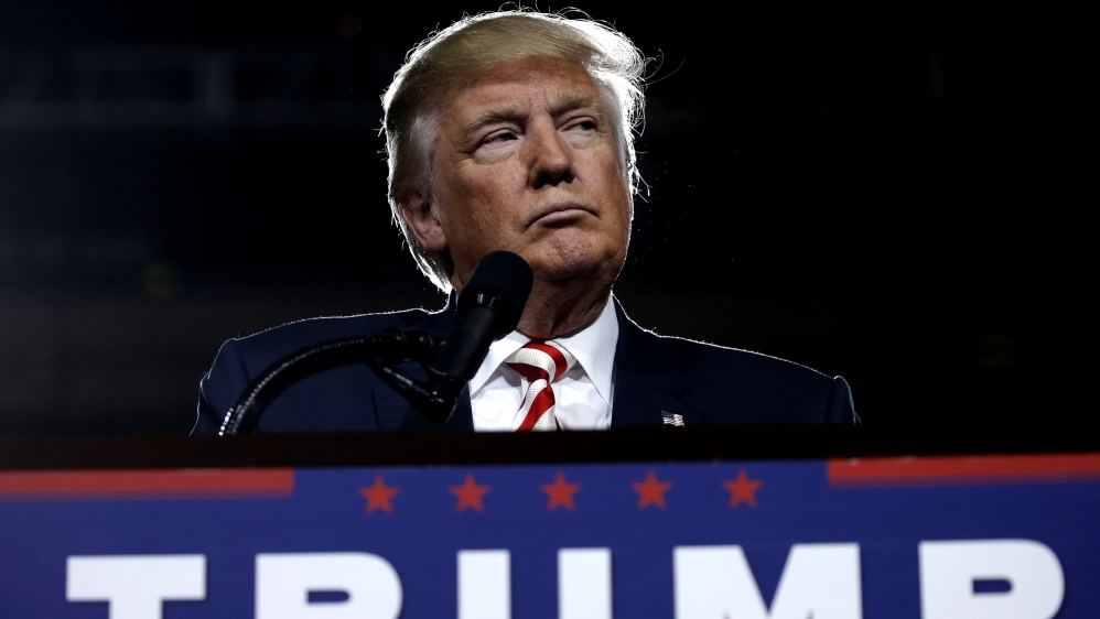 U.S. Republican presidential nominee Donald Trump looks on during a campaign rally in Prescott Valley