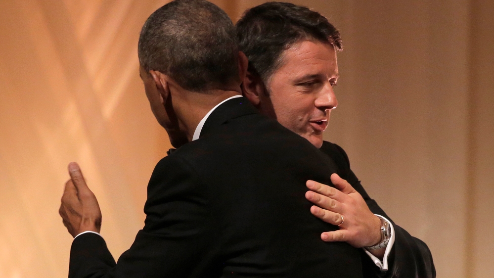 U.S. President Obama and Italian Prime Minister Renzi hug during an exchange of toasts during a State Dinner at the White House in Washington