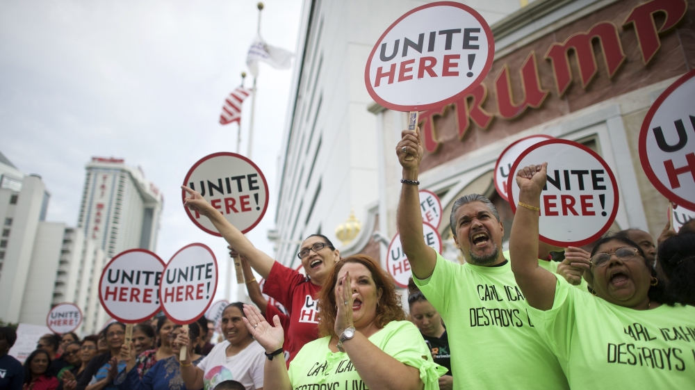 Some of estimated 2,000 union workers from the mid-Atlantic rally on the boardwalk in front of the Trump Taj Mahal Casino before a march in Atlantic City New Jersey