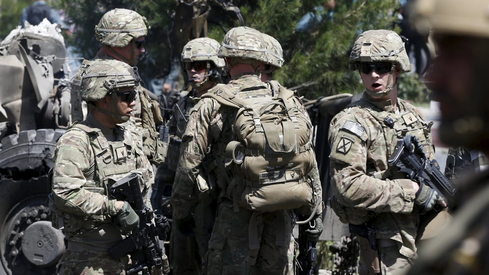 U.S. troops arrive at the site of a suicide bomb attack in Kabul