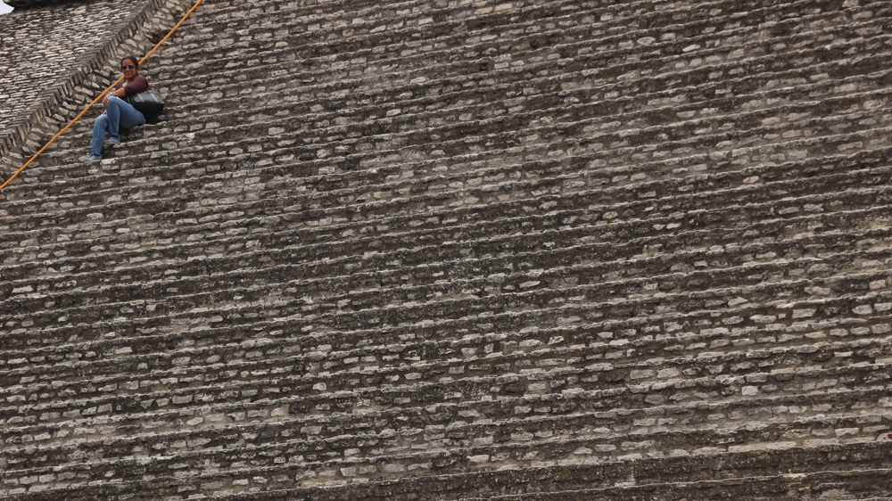 An exposed section of the largest pyramid in the world, the Great Pyramid of Cholula   [Ryan Mallett-Outtrim/Al Jazeera]  