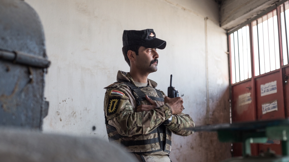 
Abdulkadir is one of a team given the often lethal job of disabling the weapons, typically left by ISIL [John Beck/Al Jazeera] 
