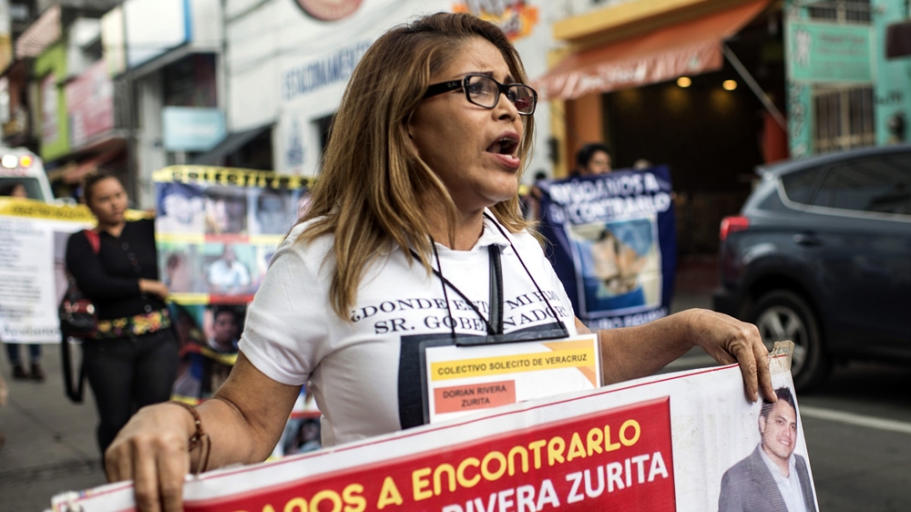 The same mixture of bewilderment, sorrow and determination is ever present among the 42 people in the caravan [Encarni Pindado/Al Jazeera]