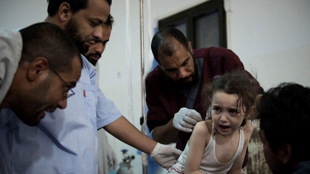 Children are traumatised by the bombs and fighting outside  [Alessio Romenzi/Al Jazeera]