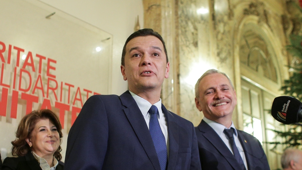 Sorin Grindeanu gestures while answering a question