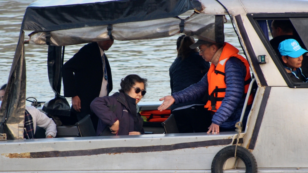 UN special rapporteur on Myanmar Yanghee Lee, centre, departs from Sittwe to visit areas of northern Rakhine State on Saturday [AFP]