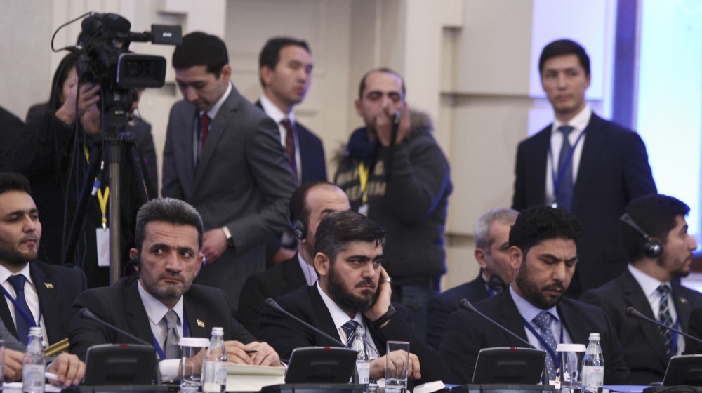 Head of Syrian opposition delegation Alloush attends Syria peace talks in Astana