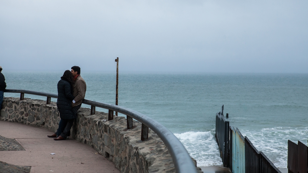The US-Mexico wall as seen from Playas de Tijuana in Mexico [Jessica Chao/Al Jazeera]