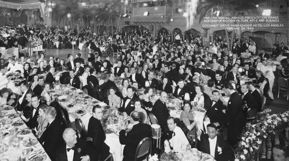 Oscar-winning actress Hattie McDaniel, centre, bottom, at the back of the room with only half her face showing in this photo [Reuters]