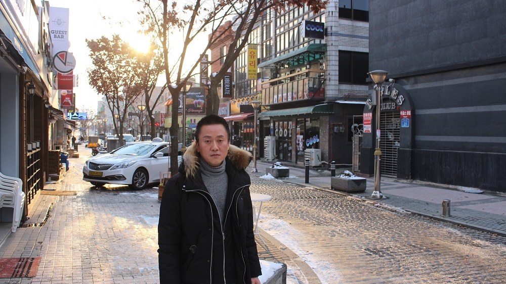 Park Kyung-chan has spent most of his adult life running bars and other businesses which cater mostly to US military personnel [Steven Borowiec/Al Jazeera] 