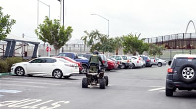 A Customs and Border Patrol officer patrols the US side of the border with Mexico   [Jessica Chou/Al Jazeera] 