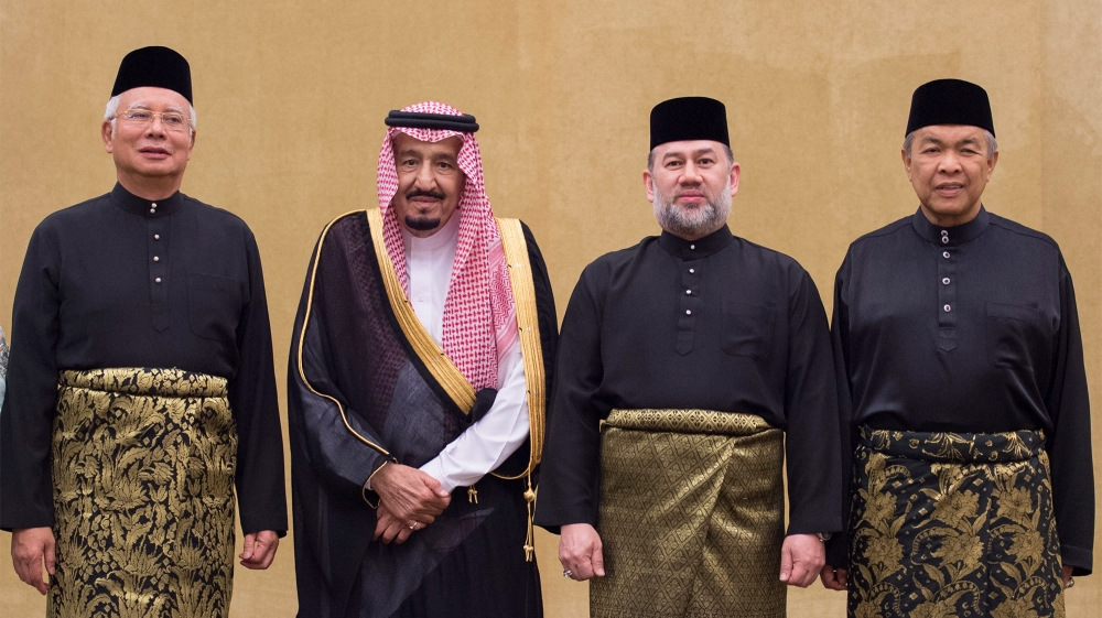 Saudi Arabia''s King Salman poses for a photo with Malaysian King Muhammad V and Malaysian Prime Minister Najib Razak in Kuala Lumpur