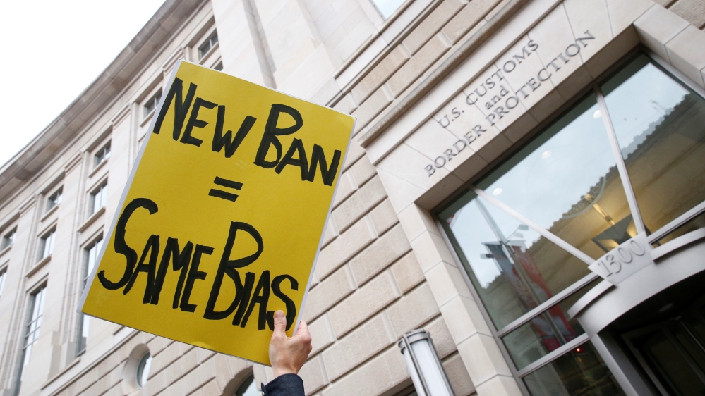 Immigration activists rally outside of the U.S. Customs and Border Protection headquarters in Washington