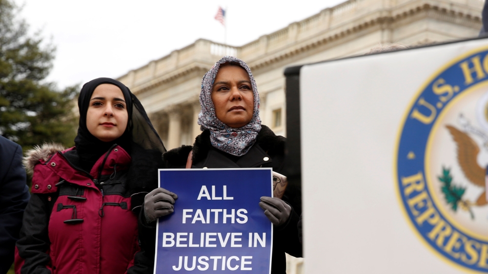 Muslim women listen to remarks during a news conference on Capitol Hill in Washington