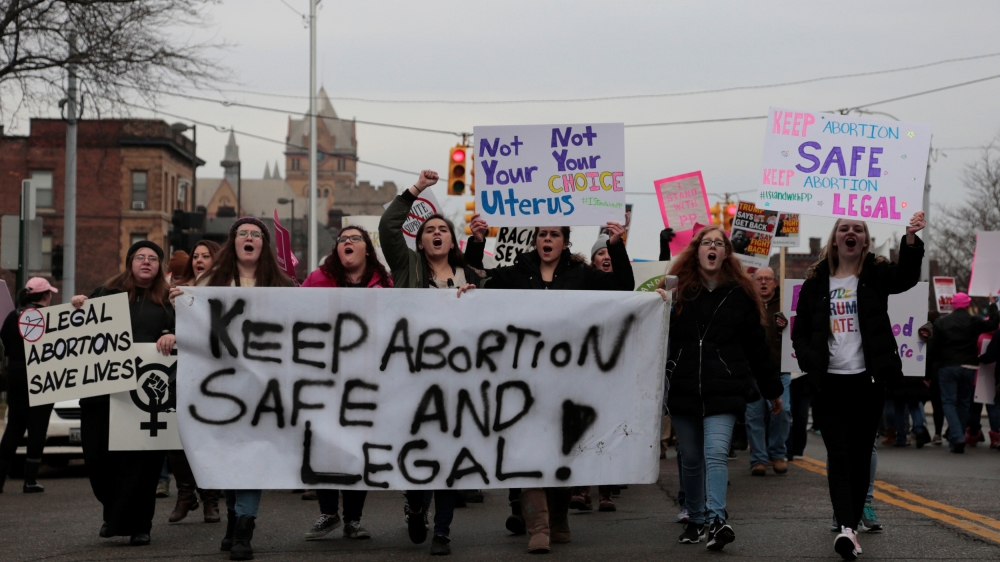Supporters of Planned Parenthood rally outside a Planned Parenthood clinic in Detroit, Michigan