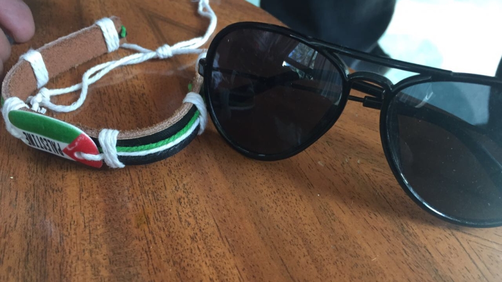 
 Basil's friends collected a few of his belongings and returned them to his mother  [Shatha Hammad]
