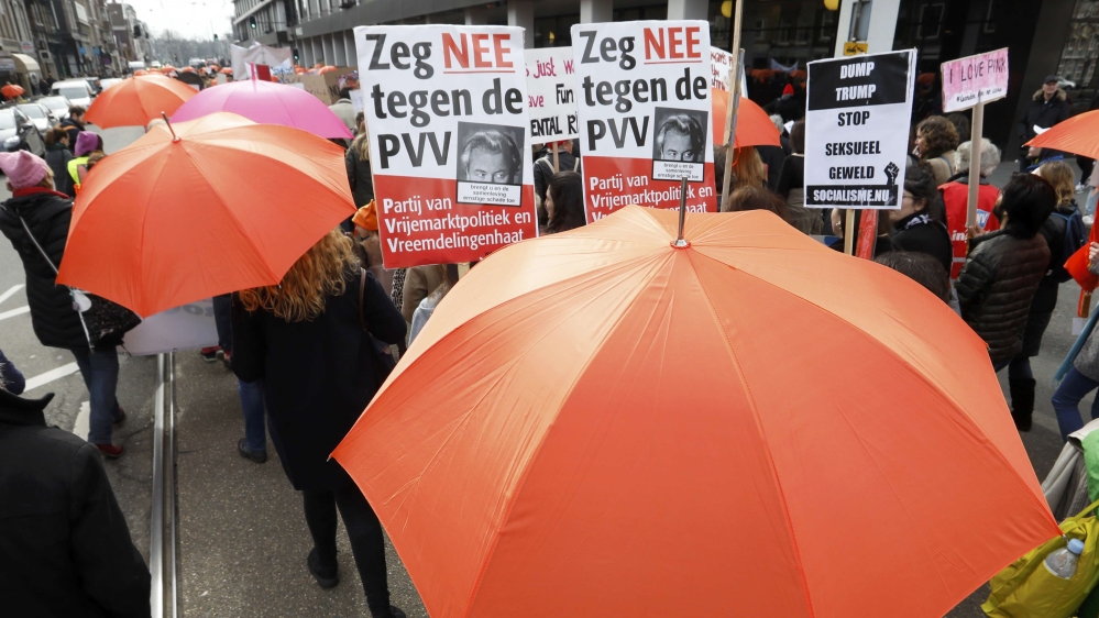 Demonstrators march to insprire public to vote against hate in Amsterdam