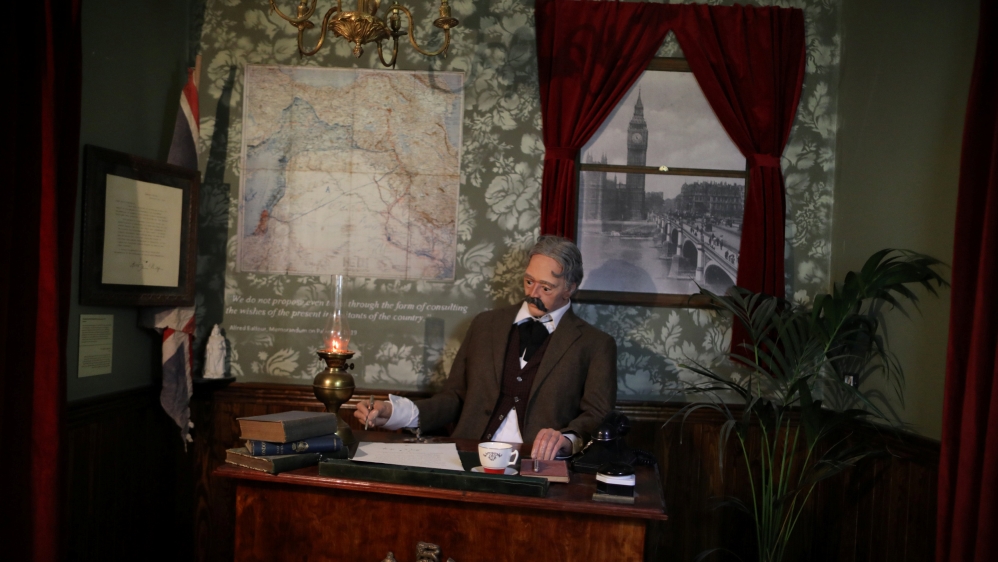 A re-enactment of the signing of the Balfour Declaration is seen inside the Walled Off Hotel, in the West Bank city of Bethlehem [Ammar Awad /Reuters] [-]