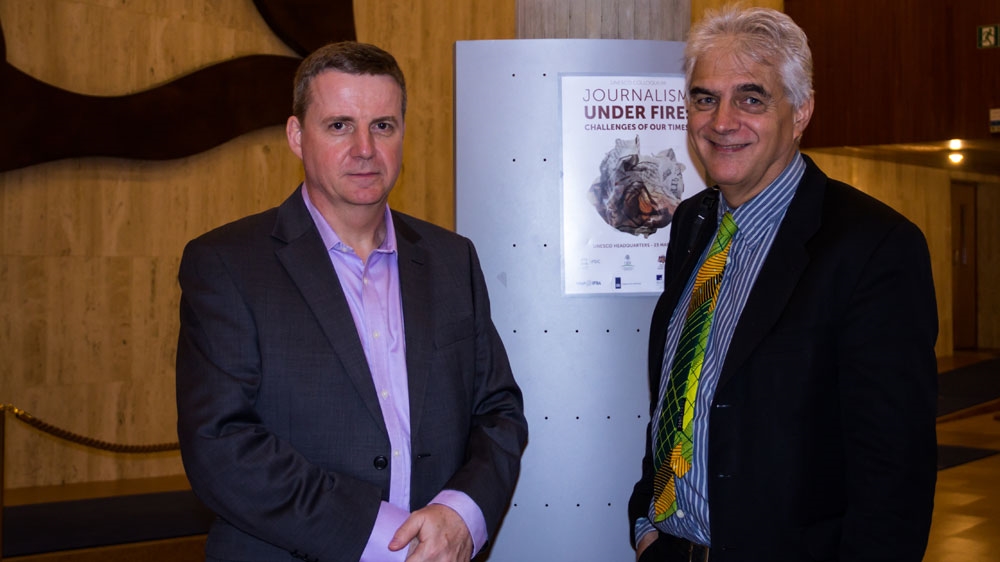 Al Jazeera's Giles Trendle, left, with UNESCO's Guy Berger, right [Naima Bouteldja/Al Jazeera]