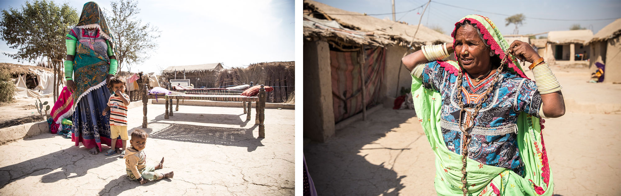 
Most of the residents at Azad Nagar are Hindu. Kasturi, right, demonstrates how the bonded labourers were chained up [Faras Ghani/Al Jazeera]
