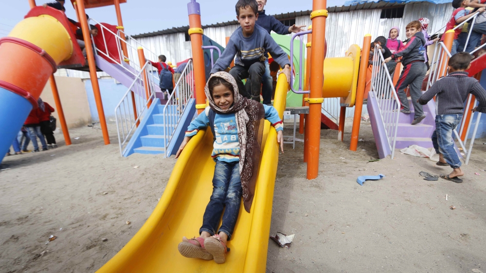 Some of the schoolchildren recently arrived from Aleppo [Hosam Katan /Reuters]