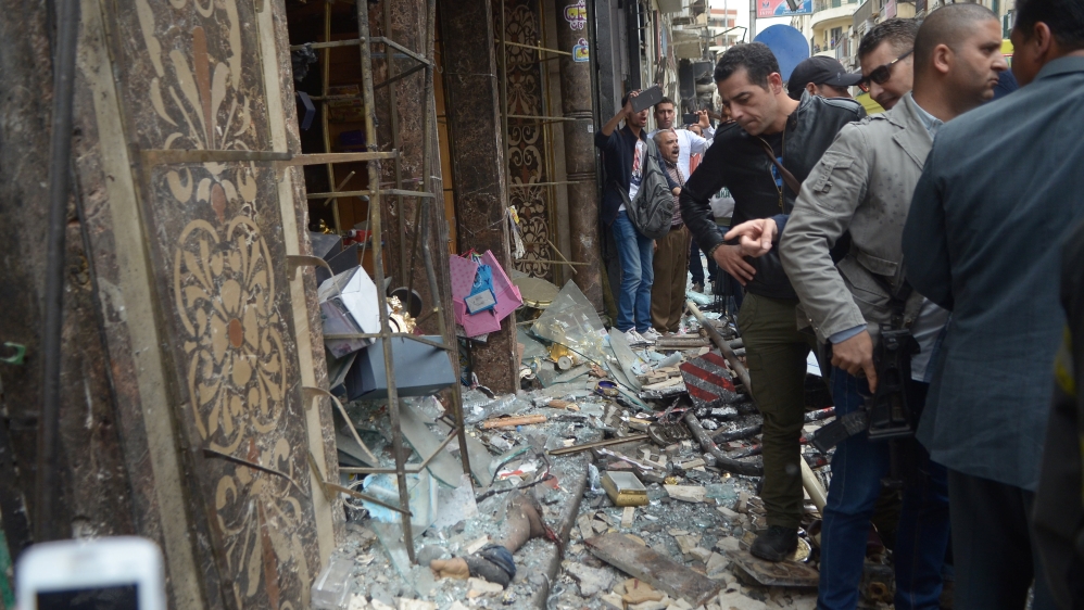 The scene of the explosion in front of the church in Alexandria [Fawzy Abdel Hamied/Reuters]
