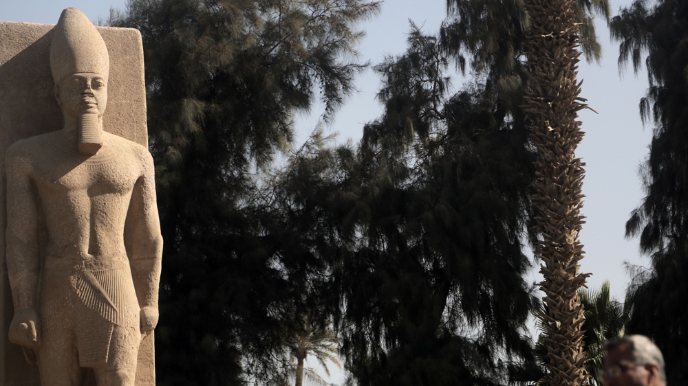 A standing statue of Ramses II in Memphis. Tourism in Egypt has plummeted from 14.7 million people in 2010 to 5.4 million in 2016 [Dorian Geiger/Al Jazeera]