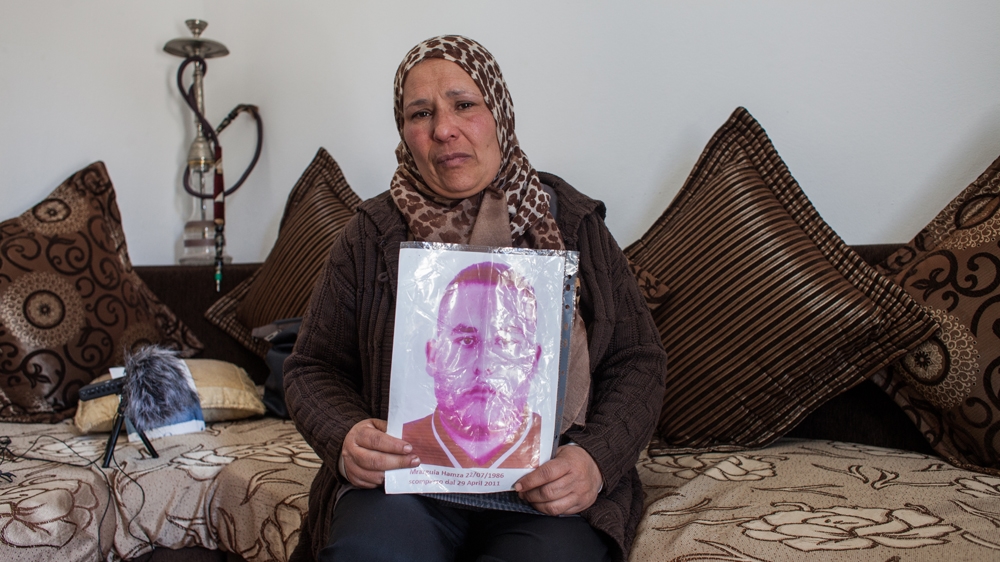Souad Rouahi's friend, Faouzia, lost her son in April 2011 and has been searching for him ever since [Arianna Pagani/Al Jazeera]