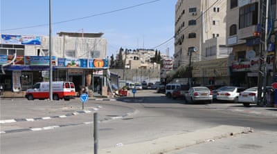 The Arab Studies Society's office is a few metres from the separation wall [Ylenia Gostoli/Al Jazeera]