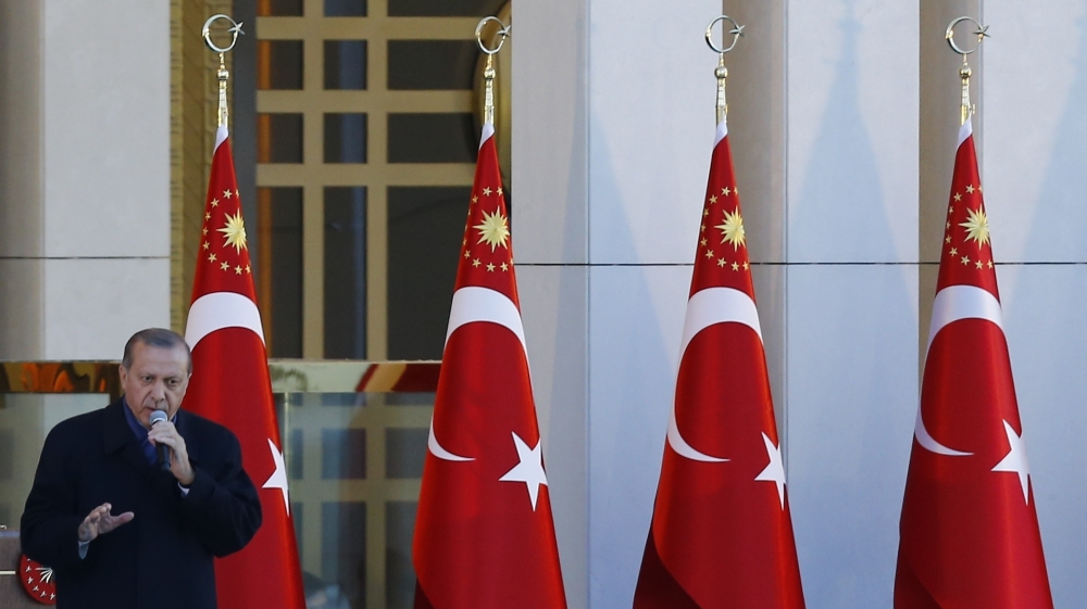Turkish President Erdogan addresses his supporters at the Presidential Palace in Ankara