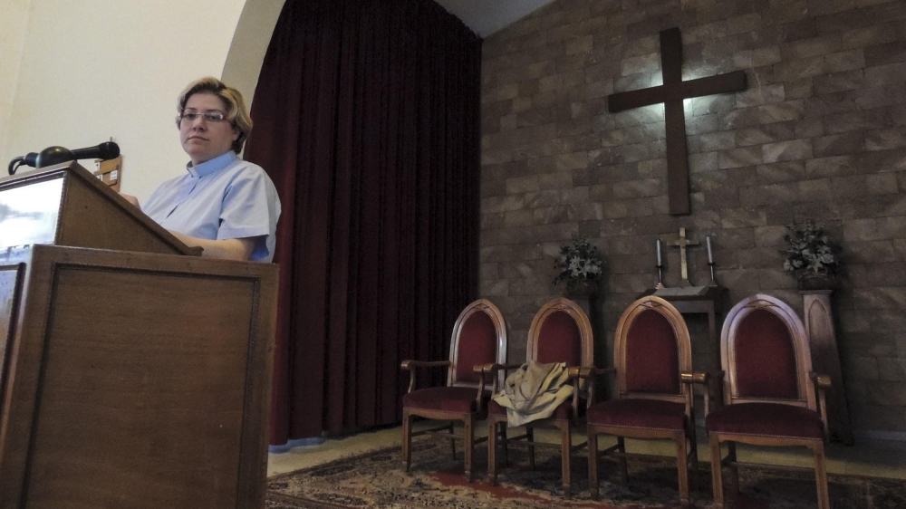 'My church was used to me. They didn't think of me in terms of gender, as a woman or a man. I served them' [Nada Homsi/Al Jazeera]