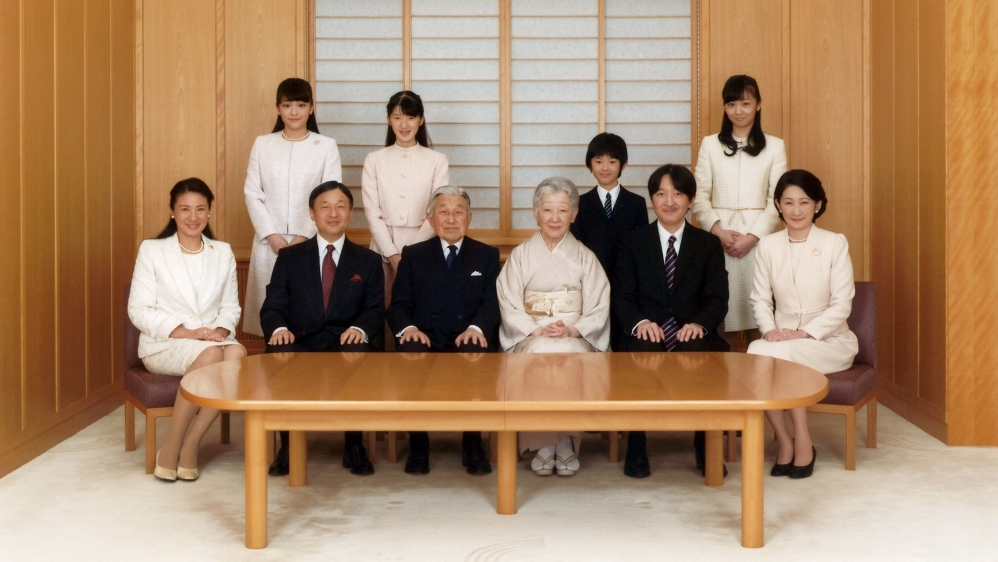 Akihito publicly cited age and declining health, which was interpreted as his wish to hand the crown to his eldest son, Crown Prince Naruhito [File: Handout/Reuters]