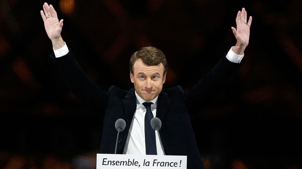 French President-elect Emmanuel Macron during a victory celebration outside the Louvre museum in Paris [Thibault Camus/AP]