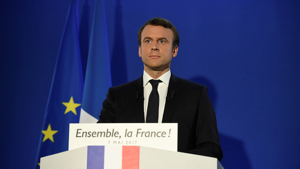 Unlike his rival Marine Le Pen, Macron is an ardent supporter of the EU [Lionel Bonaventure/Reuters]
