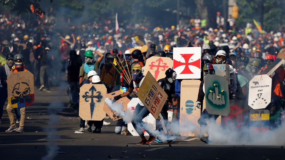 The protests have degenerated into violence that has left 47 dead [Carlos Garcia Rawlins/Reuters]