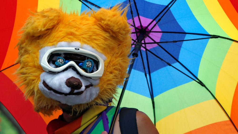 A supporter holds a rainbow umbrella during a rally ahead of Taiwan''s top court ruling on a same-sex marriage case which will decide whether it will become the first place in Asia to recognise same-