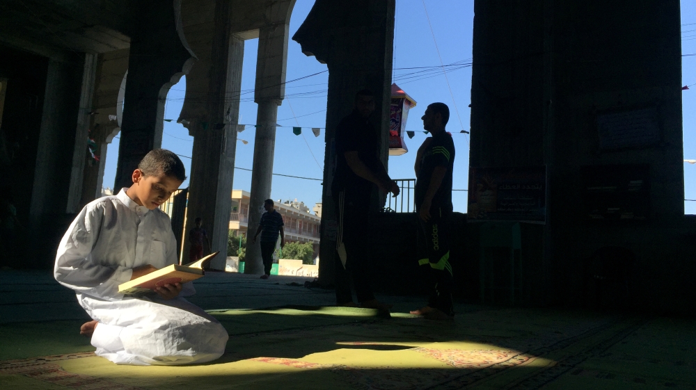 Other than fasting during Ramadan, Muslims also read the Quran, pray and give to charity, among other acts of worship [Suhaib Salem/Reuters]