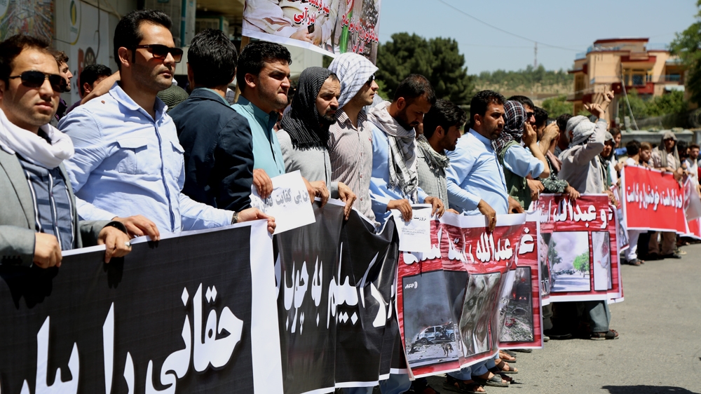 Police fired warning shots and used water cannon and tear gas [Fatima Faizi/Al Jazeera]