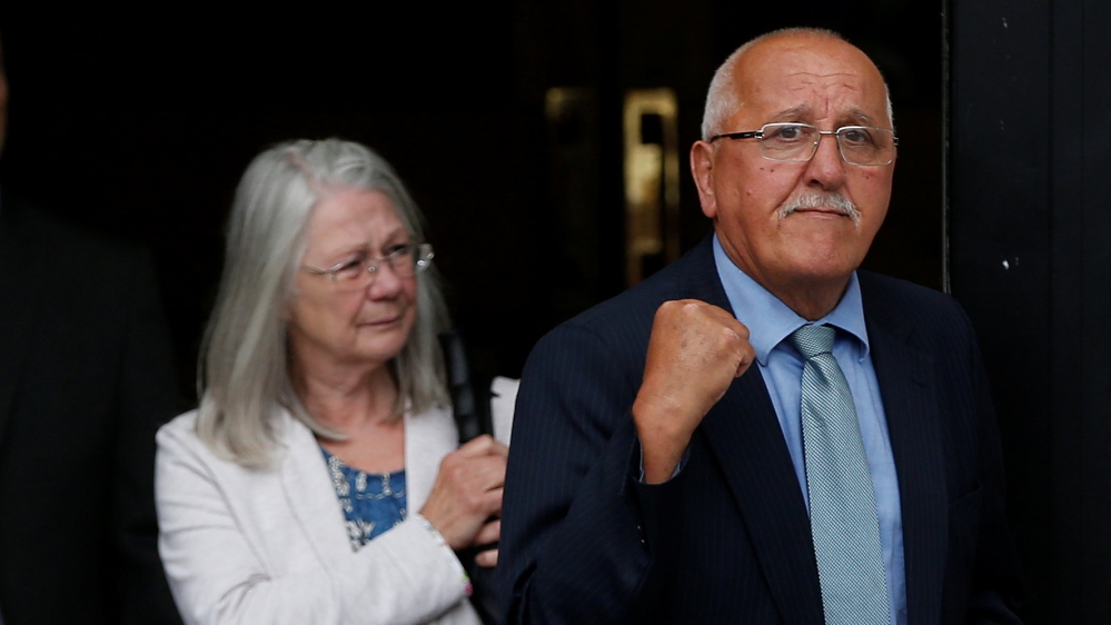 Family members of victims of the Hillsborough react outside Parr Hall in Warrington