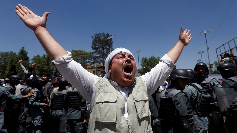 As anger against the government has grown, President Ghani's international partners have become increasingly alarmed [Reuters]