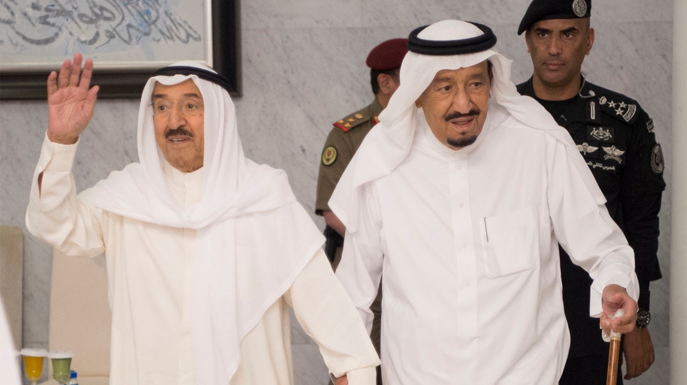Saudi Arabia''s King Salman bin Abdulaziz Al Saud holds hands with Emir of Kuwait Sabah Al-Ahmad Al-Jaber Al-Sabah in Jeddah