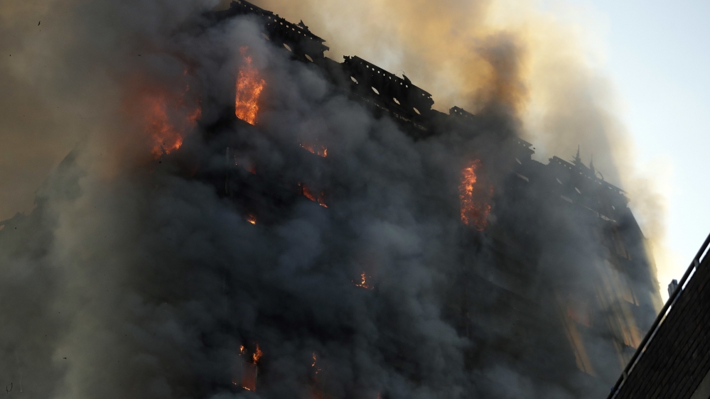 People were still stuck inside the building, according to witnesses [The Associated Press]